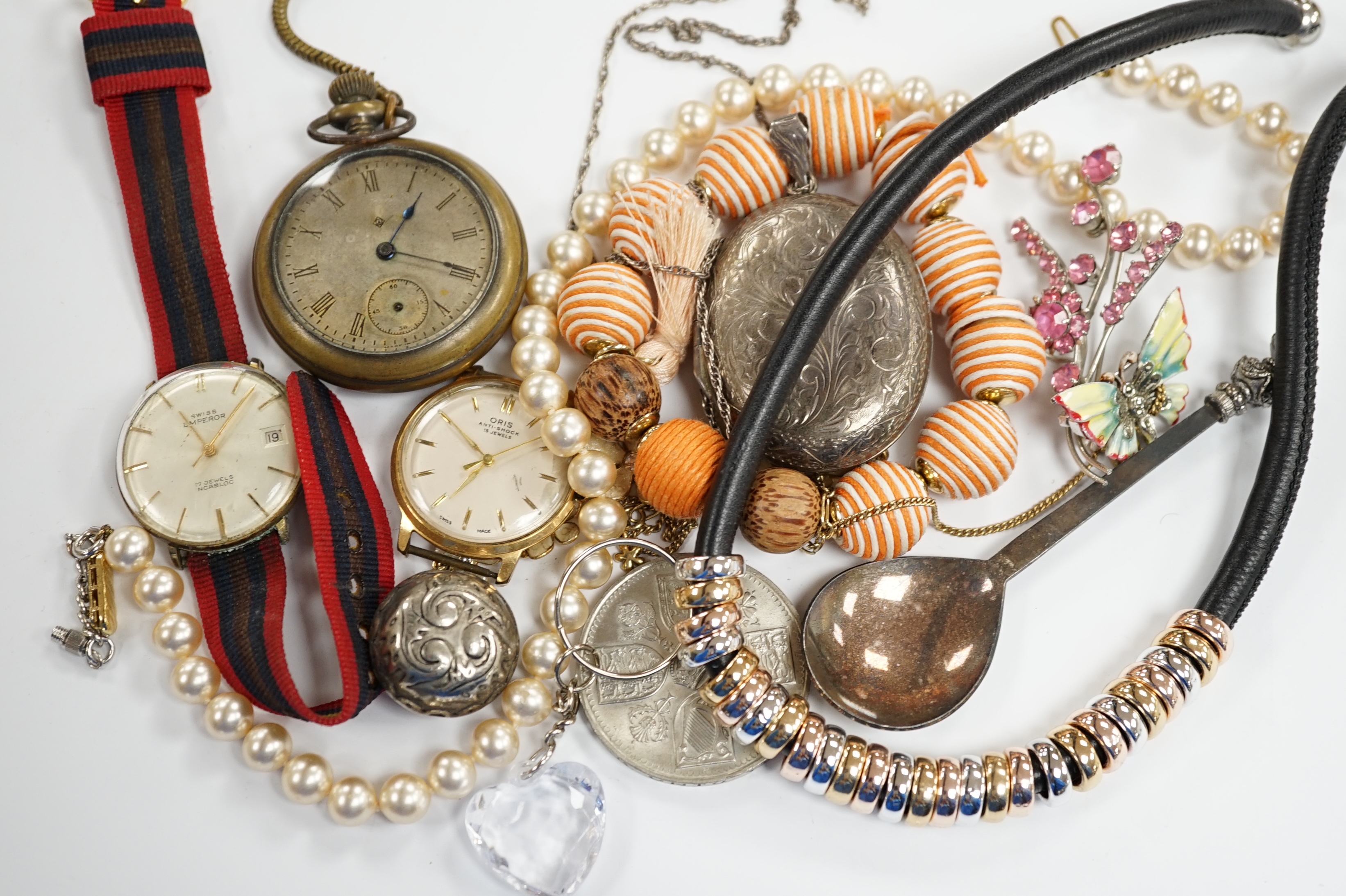 A quantity of assorted costume jewellery and other items including wrist watches, pocket watches and coins.